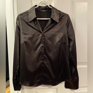 NWOT. Women’s Essentials shiny black polyester dress shirt. Medium. Never worn.